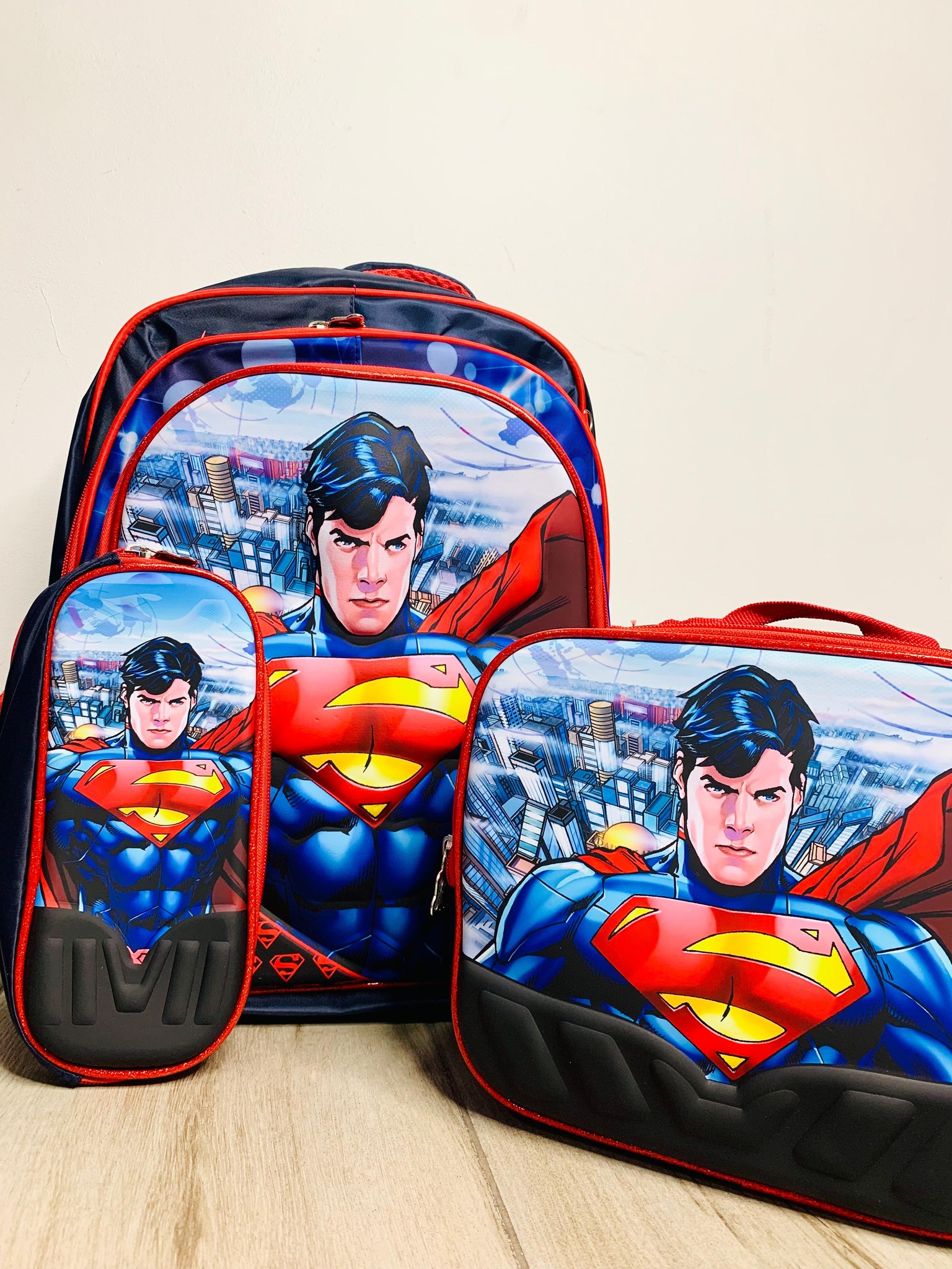 COMBO MOCHILA CON LUZ SUPERMAN #327