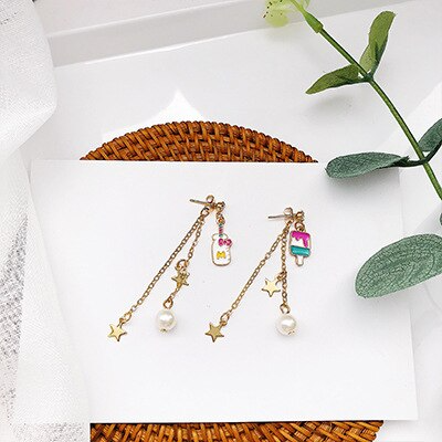 ARETES PALETA HIELO Y VASO LECHE