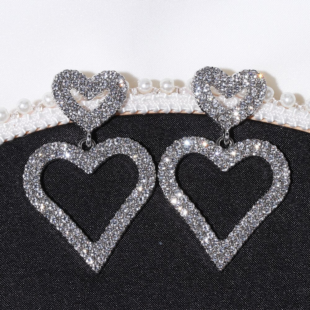 ARETE DOBLE CORAZON CON PIEDRAS