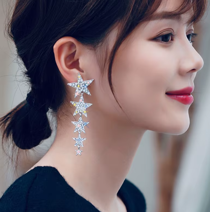 ARETES LARGOS ESTRELLAS PIEDRA TORNASOL PREMIUM