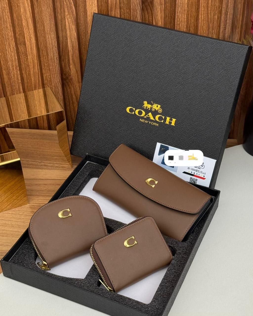TRIO DE CARTERA TIPO COACH 1000 BROWN