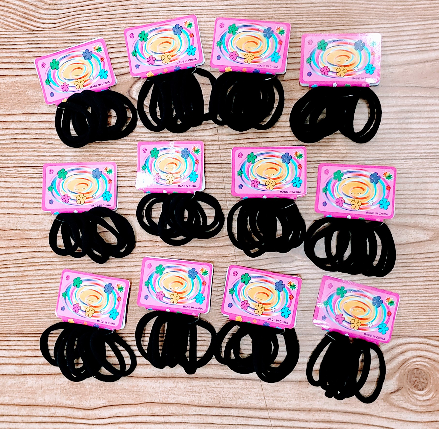 DOCE SETS DE LIGAS SENCILLAS PARA CABELLO