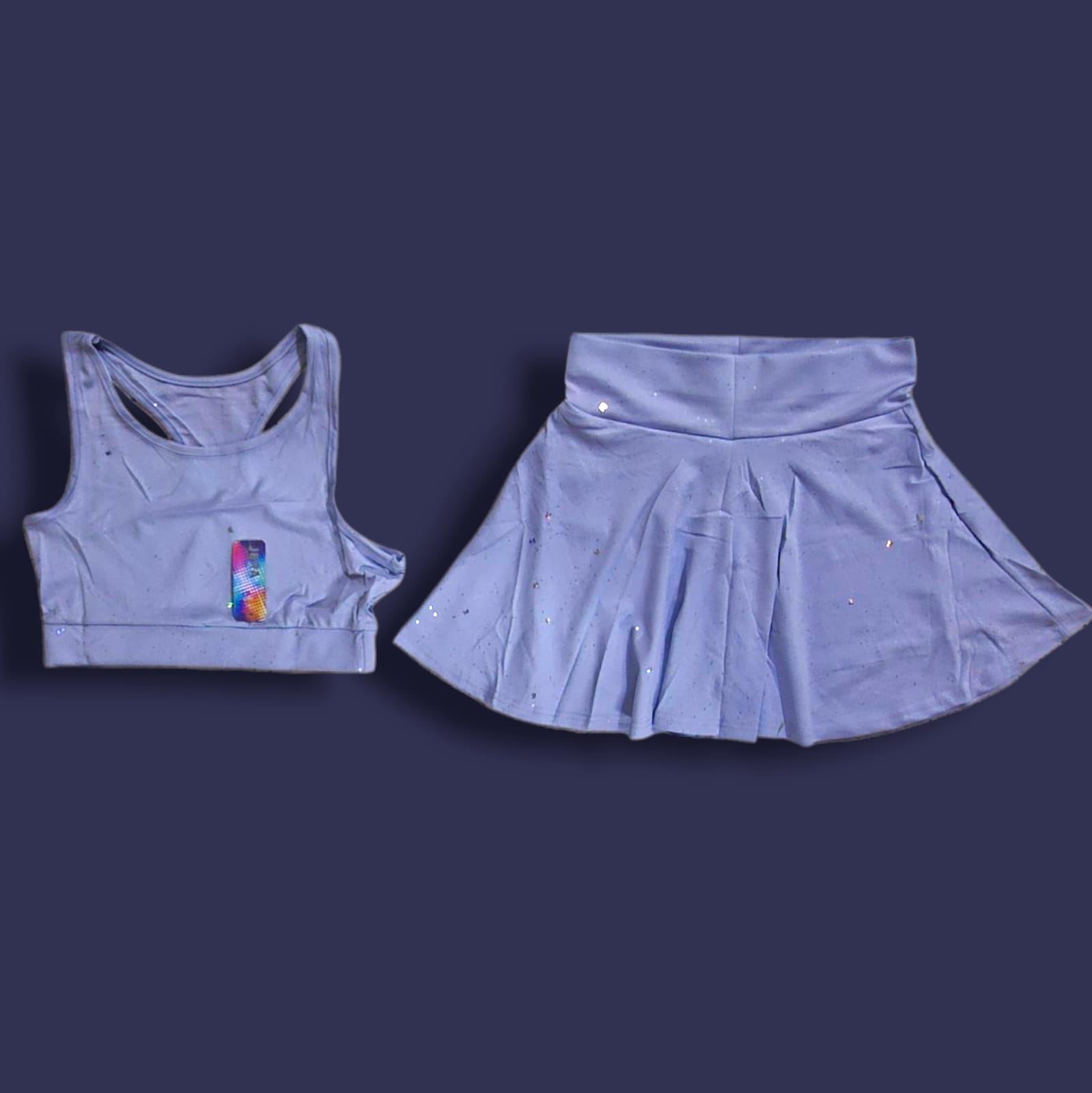 CONJUNTO DEPORTIVO FALDA Y TOP JERA CELESTE